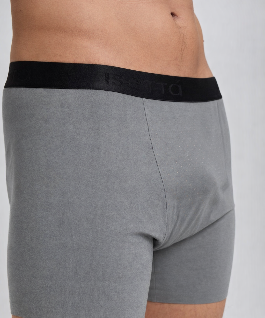 Gray boxer briefs with black waistband on a plain background