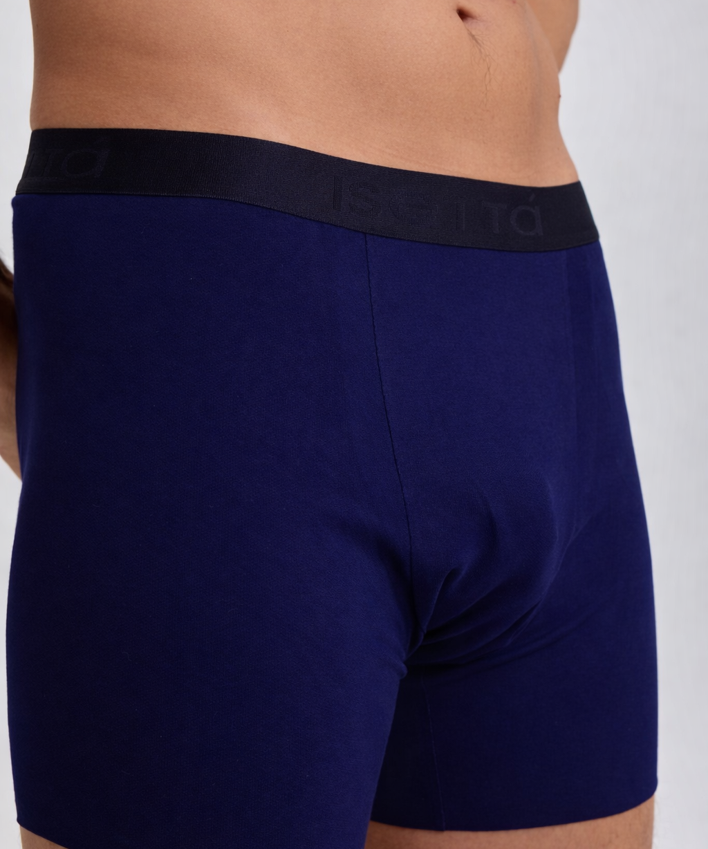 Navy blue boxer briefs with black waistband on a white background