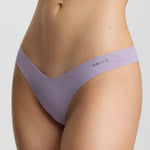 Lavender lingerie set on a plain background