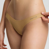 Beige lingerie set with 'Bella' branding on a plain background