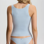 Light blue swimsuit worn by a person on a plain background